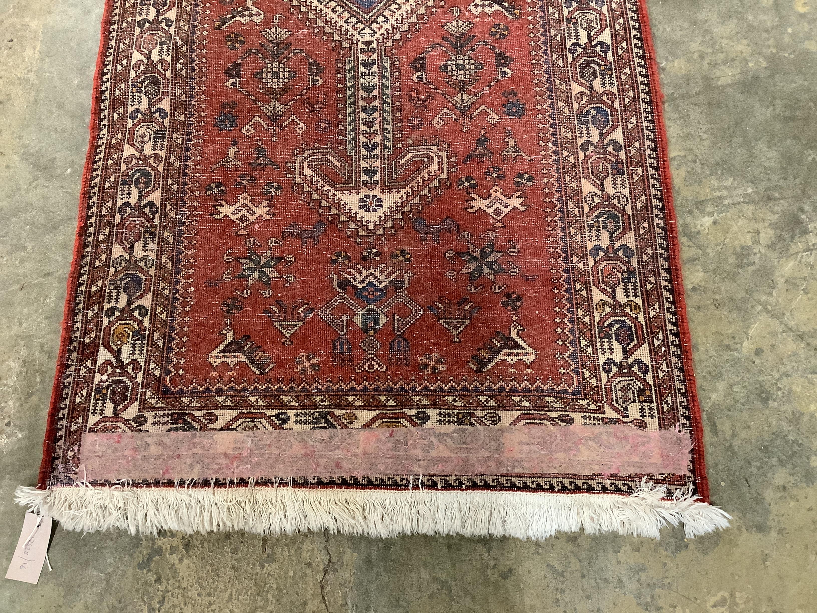 A North West Persian red ground runner, 300 x 72cm